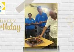 M J Laddha Chairman of Saga Elastomer Pvt Ltd Mumbai rubber manufacturer at his 80th birthday celebration with the company team